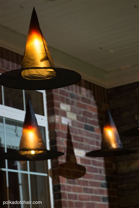 Make a Spooky Statement with a Glowing Pumpkin and Witch Hat Display